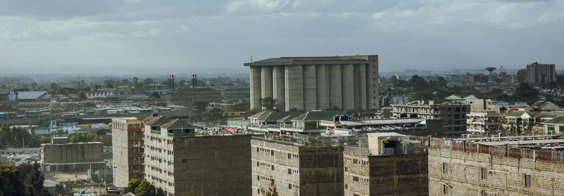 A commercial warehouse in Nairobi's industrial area with a Goodlife Movers truck outside.