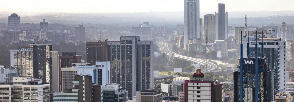 Professional movers carrying furniture into a modern home in Nairobi.